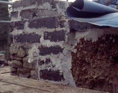 Stonework, mass cob and cob blocks forming new walltops