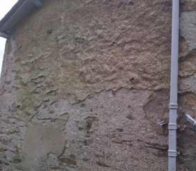 lime dashing falling away from wall in Cumbria
