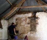 stitching cracks in mass cob walls with cob blocks