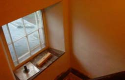 lath repair and surrounded old limework repainted with claypaint